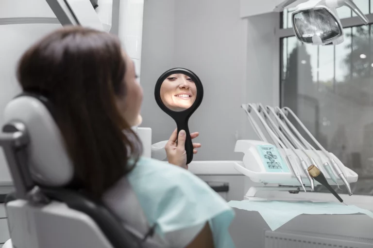 https://leads.keepsmiletravel.co.uk/wp-content/uploads/2023/09/close-up-patient-looking-mirror-768x512.webp